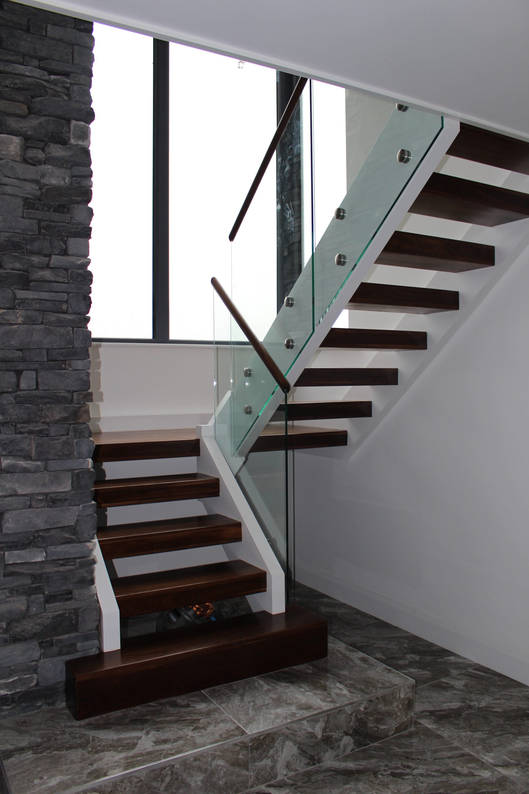 walnut stair with glass balustrade